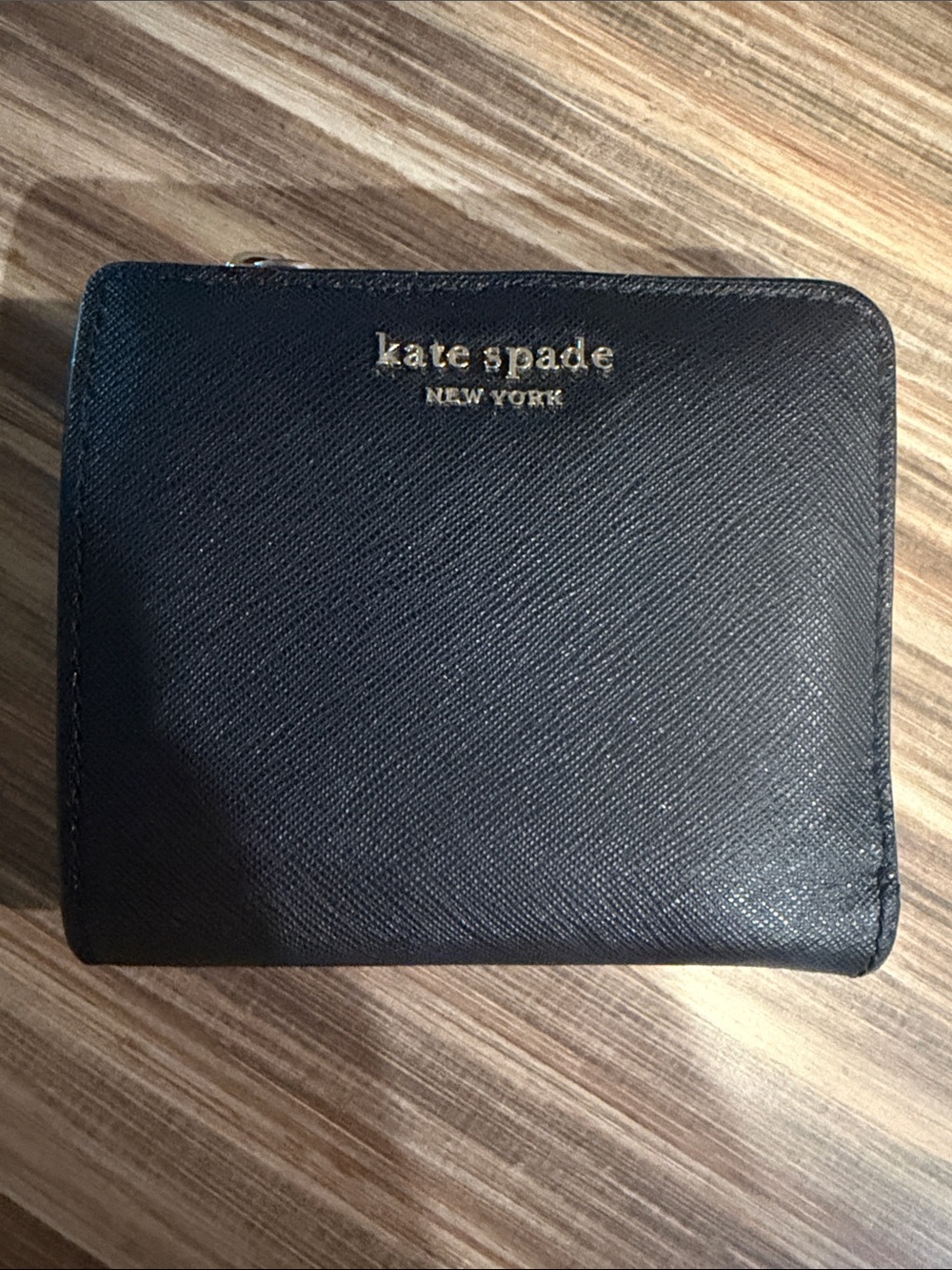 kate spade black leather compact zip wallet with gold logo
